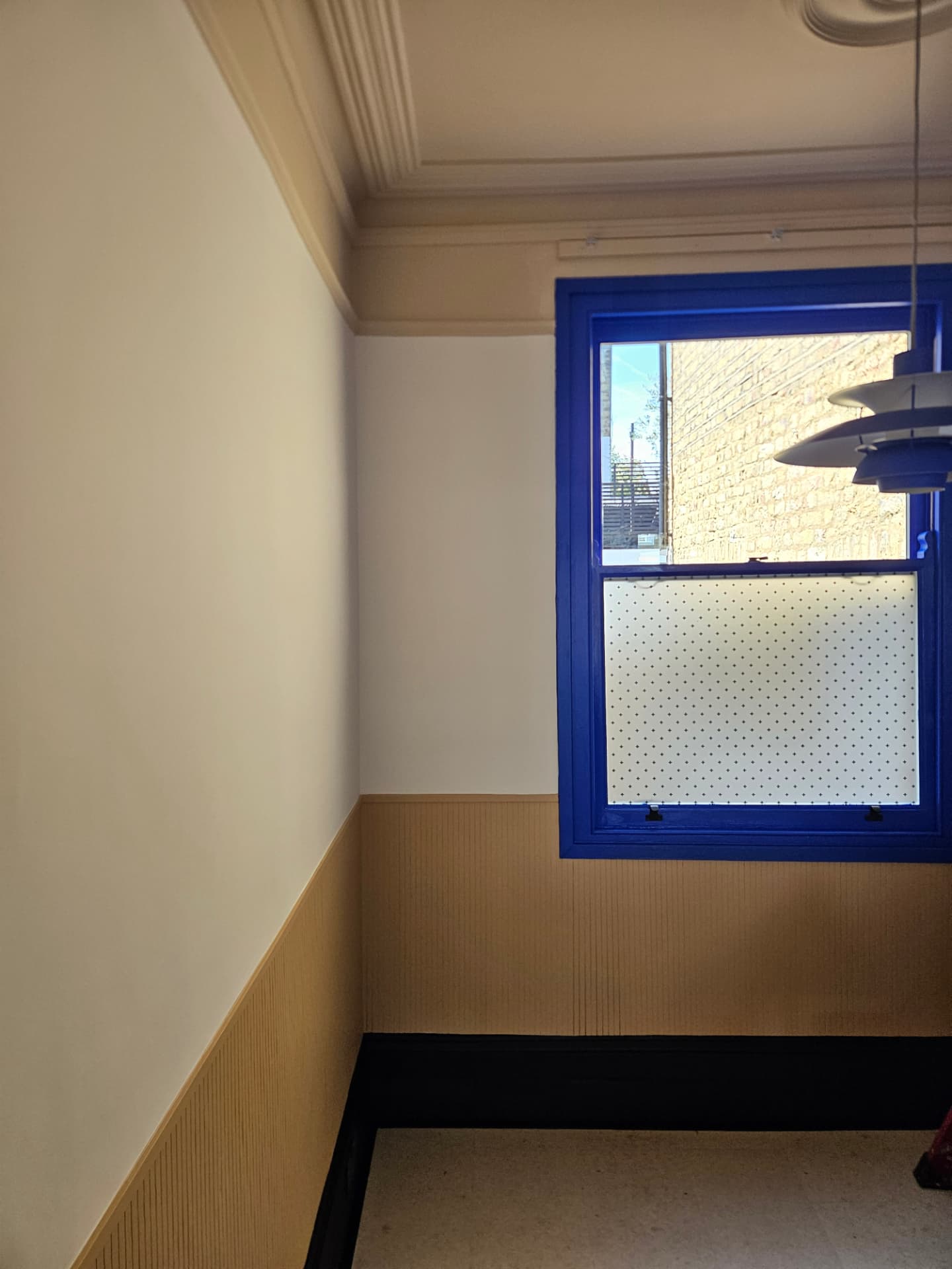 After photo — Hackney five-colour room — designed with anna, lifedesign london. Five different COAT colours in one room, every junction hand-cut for dead-straight lines.